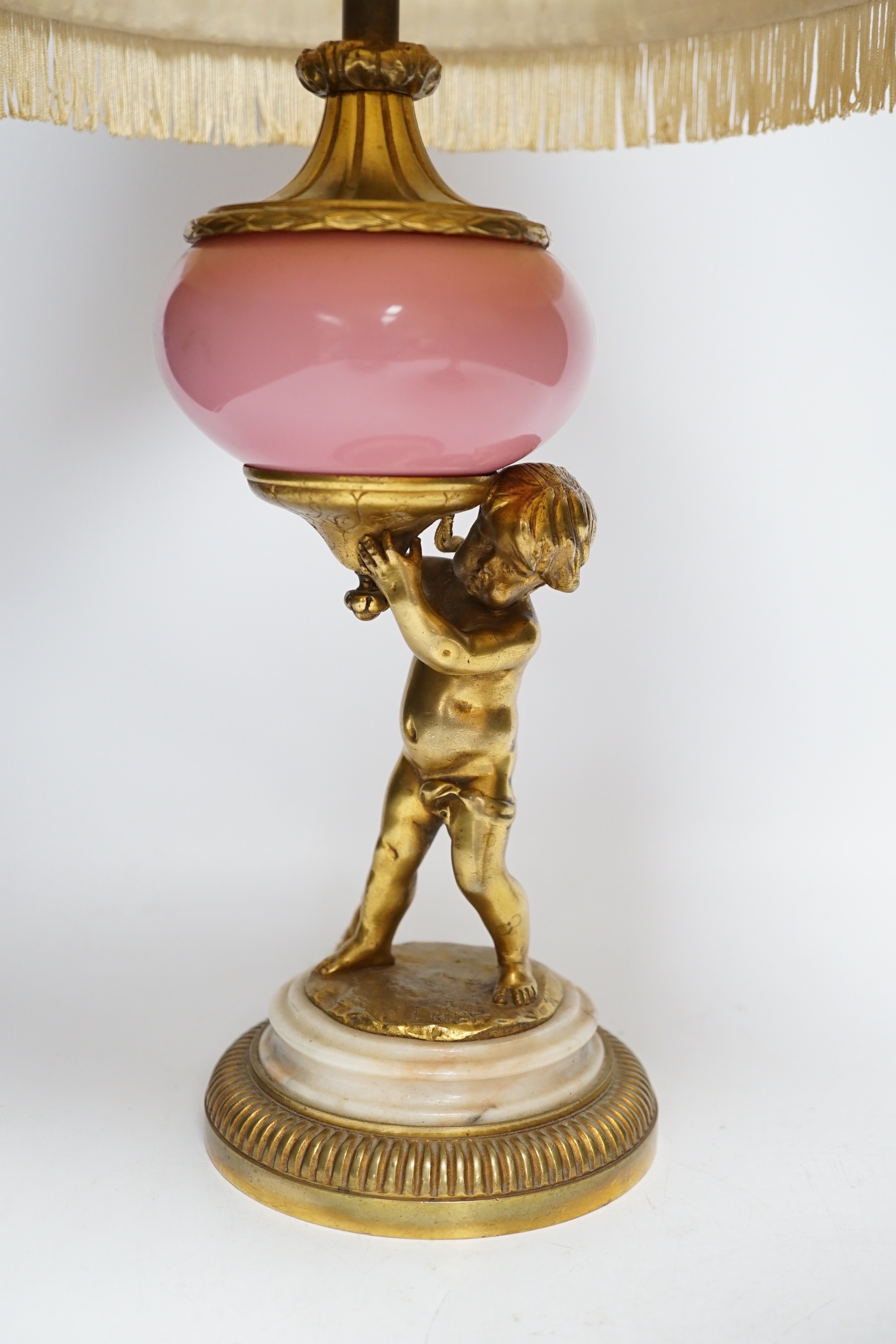A pair of early 20th century French ormolu and porcelain cherubic lamps, one signed L. Kley, 48cm including shade